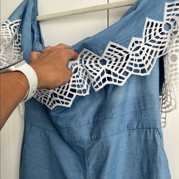 REVOLVE BARDOT Runaway Romper in Sky Blue Chambray with embroidered detail. - Picture 12 of 13